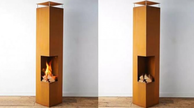 La construcción rectangular oxidó la madera al aire libre de acero de la chimenea de Corten que quemaba Chiminea