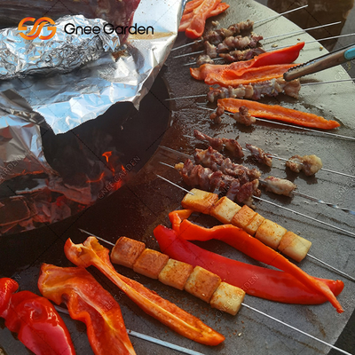 Fuego de acero Pit With Firewood Storage Backyard Rusty Colour de Corten de la BARBACOA al aire libre