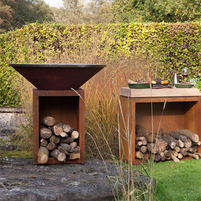 Fuego de acero aherrumbrado Pit Outdoor With Wood Storage de la altura el 100cm Corten