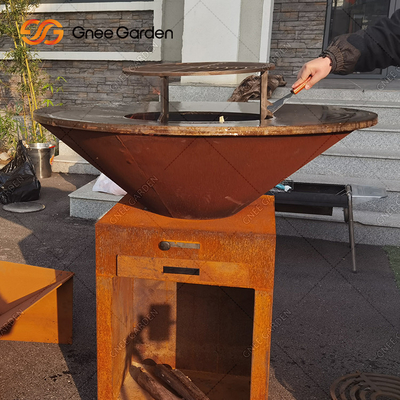Las parrillas de cocinar al aire libre de acero de Corten del moho del jardín encienden servicios de empaquetado de la parrilla de la BARBACOA del hoyo